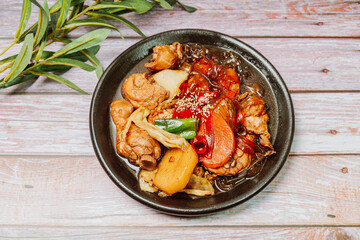 Andongjjimdak, Korean Braised Chicken : To make this dish, chicken is cut into pieces and braised with carrot, potato, and other vegetables, along with a soy sauce-based seasoning. Glass noodles can b
