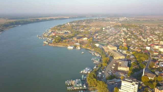 Aerial view of Tulcea city harbor and the Danube before flowing into the sea