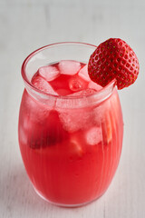 Strawberry cocktail with ice and fruits