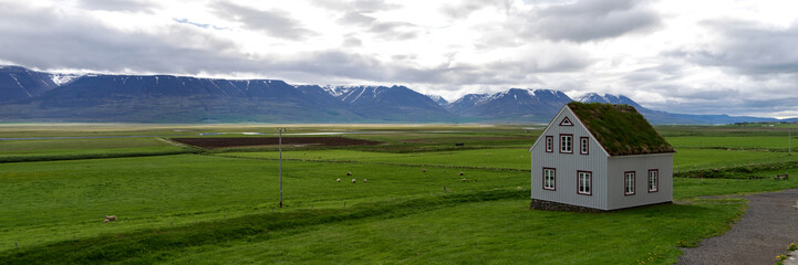 Fototapeta na wymiar Traditional icelandic wooden House in Iceland. Panoramic image
