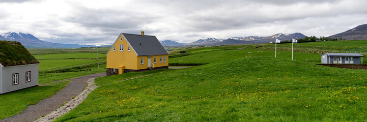 Traditional icelandic wooden House in Iceland. Panoramic image