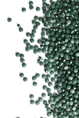 Green tablets made of natural organic spirulina