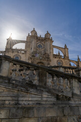 the historic cathedral of Jerez de la Frontera with a sunburst and blue sky