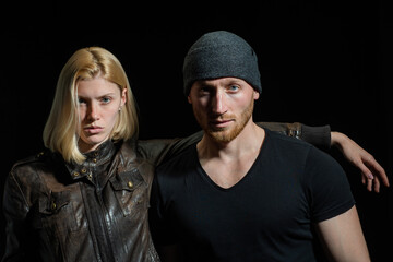 Obraz premium Couple in love, sensual lovers hugging and embracing. Couple in love on date in formal fashion look. Always in style. Portrait of sexy coupl.