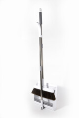 Combined White Set Broom and Scoop. Long handle and soft brush. Durable Plastic. Stainless steel. Housing. Scoop. Brush. Telescopic tubes. White background.