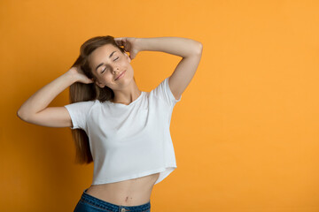 Beautiful young confident and thoughtful woman with clean perfect fresh skin and long hair. Woman...