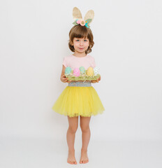 Cute little girl with bunny ears and Easter eggs on white  background. Happy Easter and Spring concept