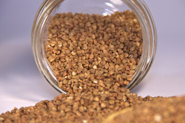 Buckwheat poured from jars. General plan.