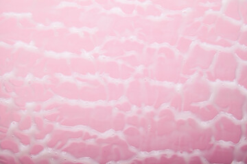 White cream smear textured background on pink background