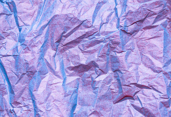 Wrinkled holographic paper purple pink abstract background
