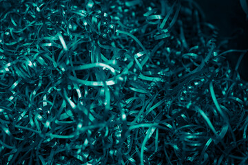 blue steel shavings with visible details. background or texture