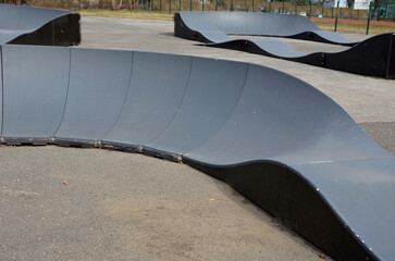 bike path in the car park Pumping (moving up and down) is used instead of pedaling and bouncing to...