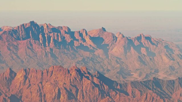 Panoramic top view of mountains of Sinai Peninsula. High peaks of Saudi Arabia rocks consisting of granites, gneisses, crystalline schists. Beautiful rocky landscape. Arabian ridge