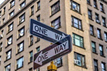 Fototapeta na wymiar Intersecting one way street signage in New York