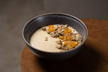 Delicious semolina pudding ( porridge ) with halva and lemon jam