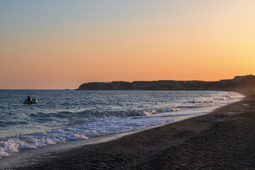 Summer landscape of Crete island in Greece in Europe. Coast in the Larapetra region. In the background is a sunny sky with clouds.