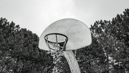 Black and white old basketball hoop at park © Nealj121