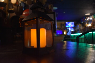 Candle lantern in rustic enviroment