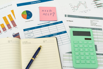 Naklejka na ściany i meble pen and calculator on financial paper chart on desk