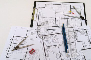 Naklejka na ściany i meble house blueprints with work tools drawing instruments on the worktable