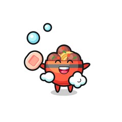 meatball bowl character is bathing while holding soap
