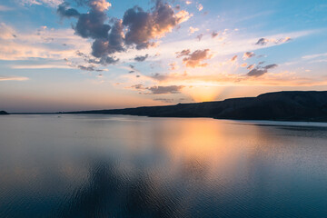 Fototapeta na wymiar lake with mountain at the sunset