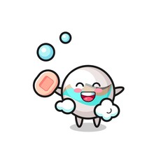 Fototapeta premium marble toy character is bathing while holding soap