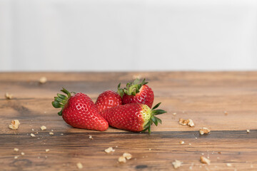 fresh strawberries on old wood table with copy space