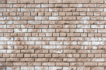 Colorful brick wall background of the building.