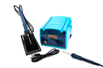 Heat adjustable soldering iron isolated on a white background. Induction soldering station, heating control regulator and soldering iron.