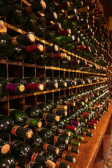 Wine cellar rack of empty bottles