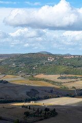 Naklejka premium View on hills and vineyards near old town Montepulciano, Tuscany, Italy