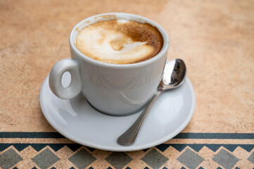 Fresh brewed coffee cappuccino in italian bar, morning coffee