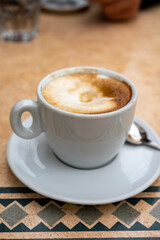 Fresh brewed coffee cappuccino in italian bar, morning coffee