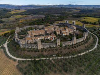 Aeriel view on medieval fortress town on hilltop Monteriggione in Tuscany, Italy