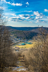 Small valley town from top of the mountain perspective, Bradford Pa USA, nature outdoor setting during early spring bloom.