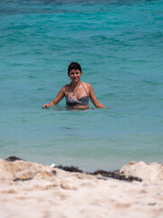 Black-Haired Woman Gets out of the Sea in San Andres, Colombia