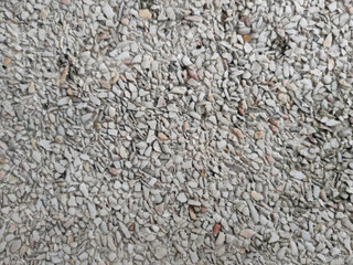 Rough and small rocky surface background and texture