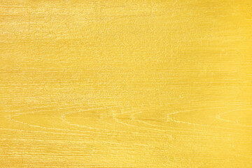 wood panel painted gold color or Retro gold color wood wall texture background