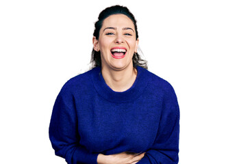 Young hispanic woman wearing casual clothes smiling and laughing hard out loud because funny crazy...