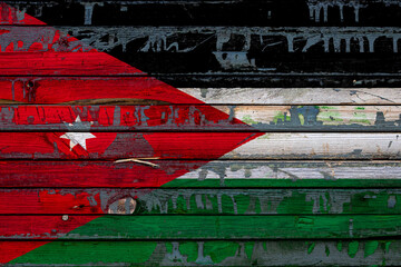 The national flag of Jordan. is painted on uneven boards. Country symbol.
