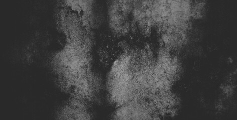 Black concrete wall or dark gray rough grainy stone texture background.