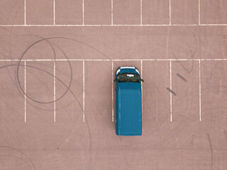 delivery van on city parking. Aerial top down view. Online shop ordering.