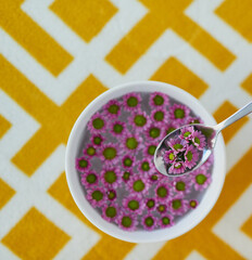 Beauty starts with nourishment. High angle shot of a bowl full of pretty pink flowers.