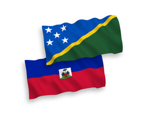 Flags of Solomon Islands and Republic of Haiti on a white background