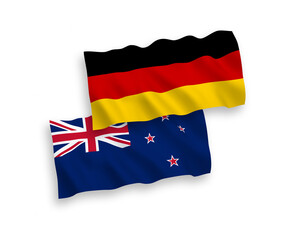 Flags of New Zealand and Germany on a white background