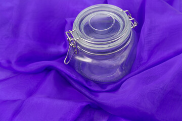 Canning sealing jar on purple background