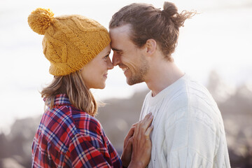 Face to face with her dream guy. Cropped shot of an attractive young couple standing face to face...