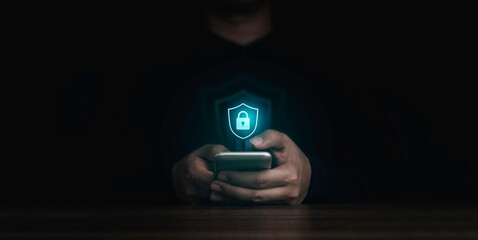 Shield lock button and personal information icons appeared while man's finger touching on smart...