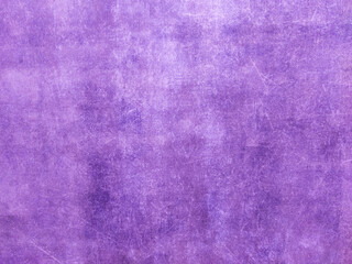 A rusty purple metal wall with scratches and scuffs. Vintage background with texture. Rough surface.

